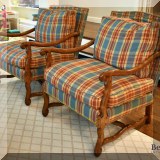 F01. 2 Open arm chairs with nail head trim and down cushions. 38”h x 29”w x 32”d 